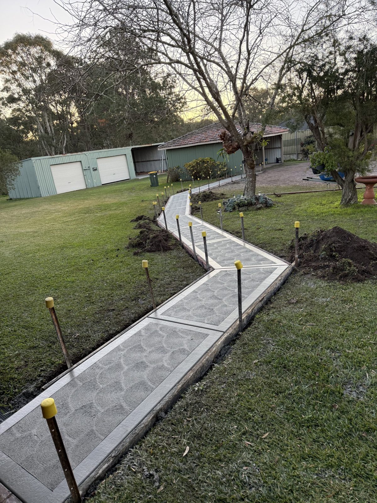 Curved patterned concrete footpath by EAB Concreting, Hunter Valley
