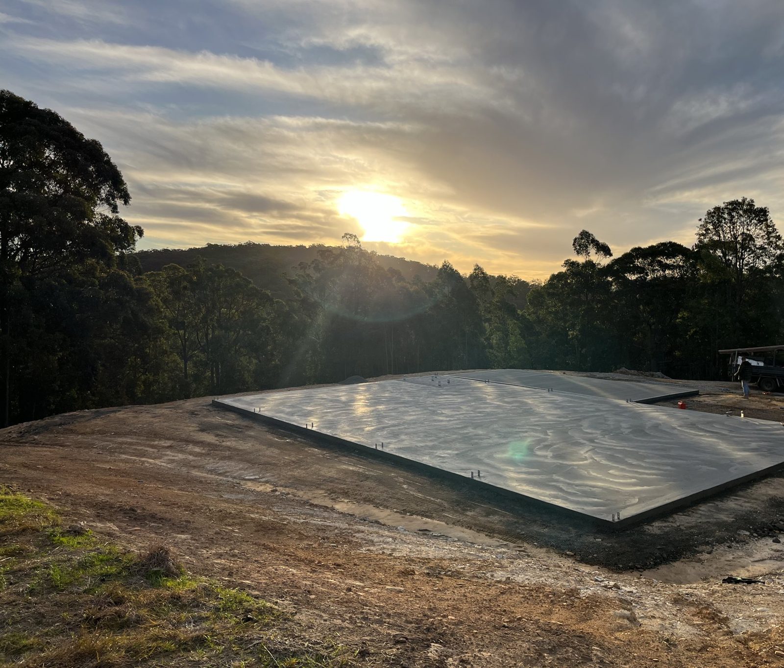 Freshly poured concrete house slab at sunset by EAB Concreting, Hunter Valley